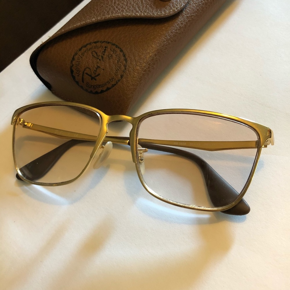 Gold Ray ban sunglasses.